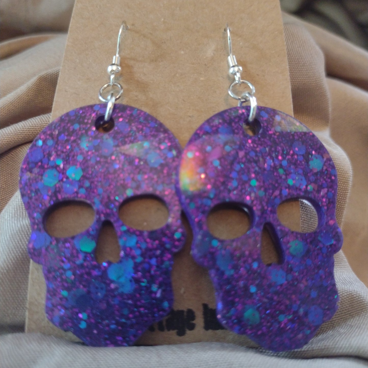 Holographic skulls purple