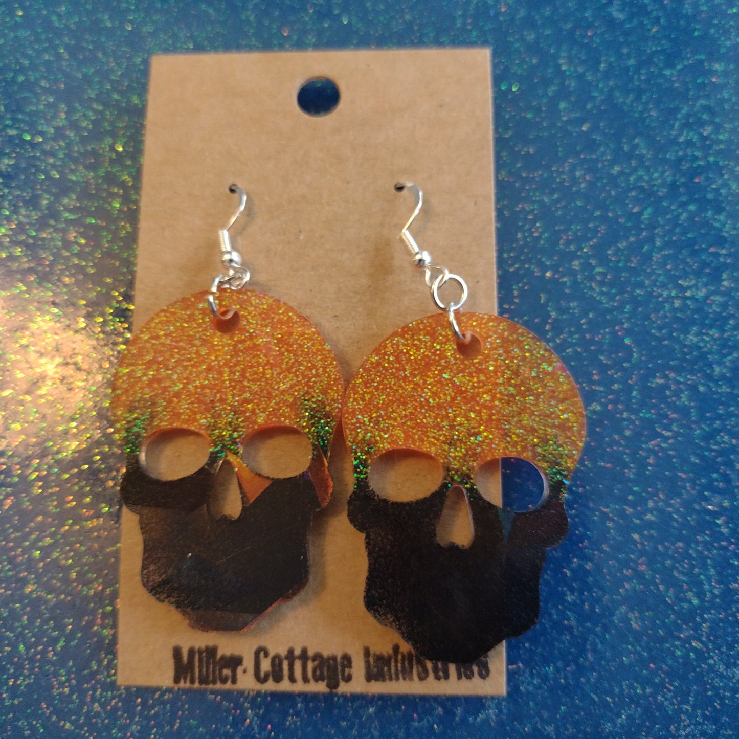 Orange and black holographic skulls