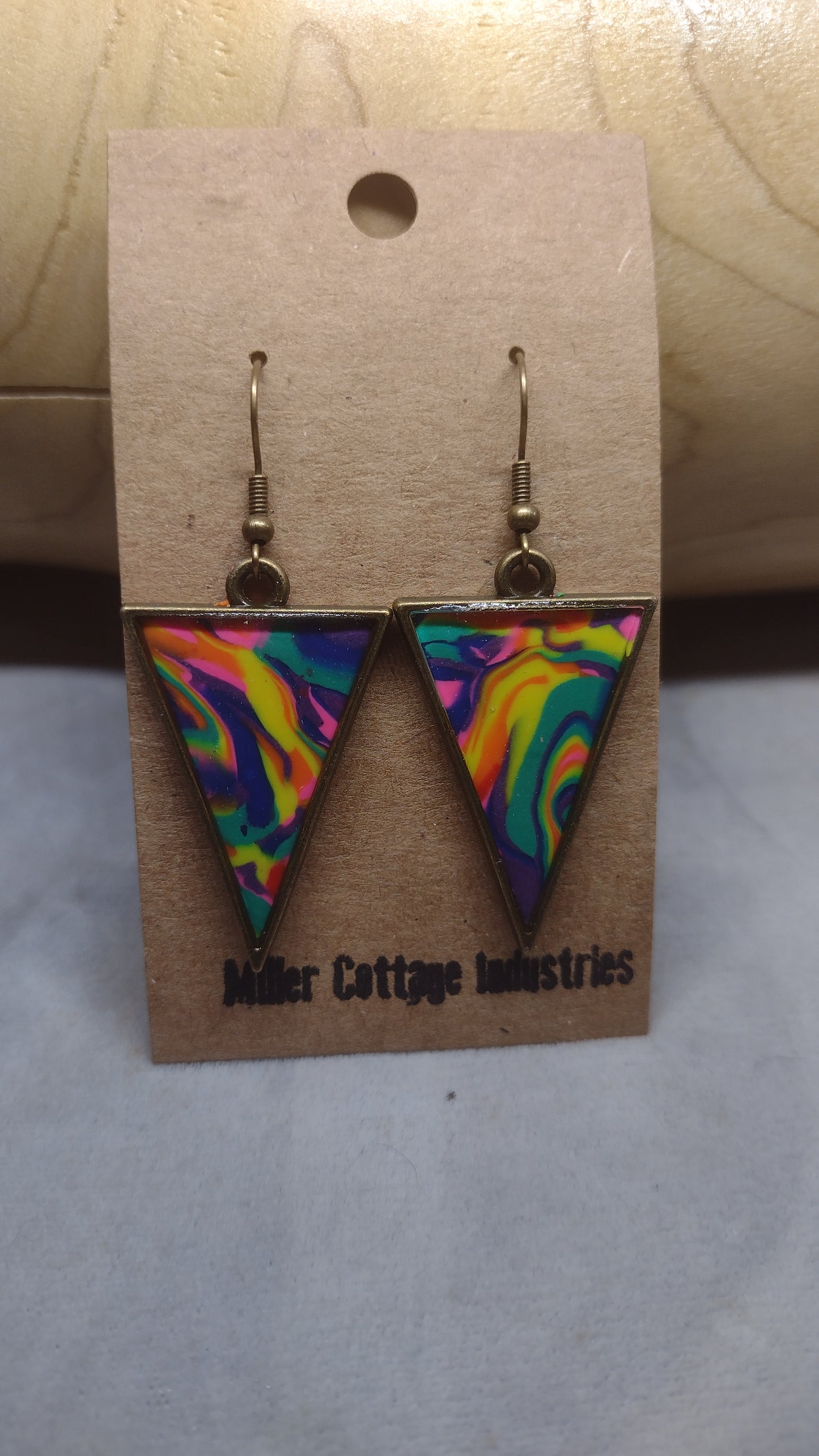 PRIDE triangle in antique bronze