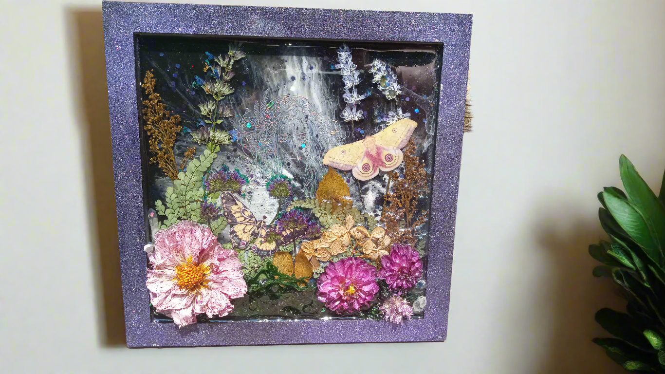 Lady hiding amongst flowers