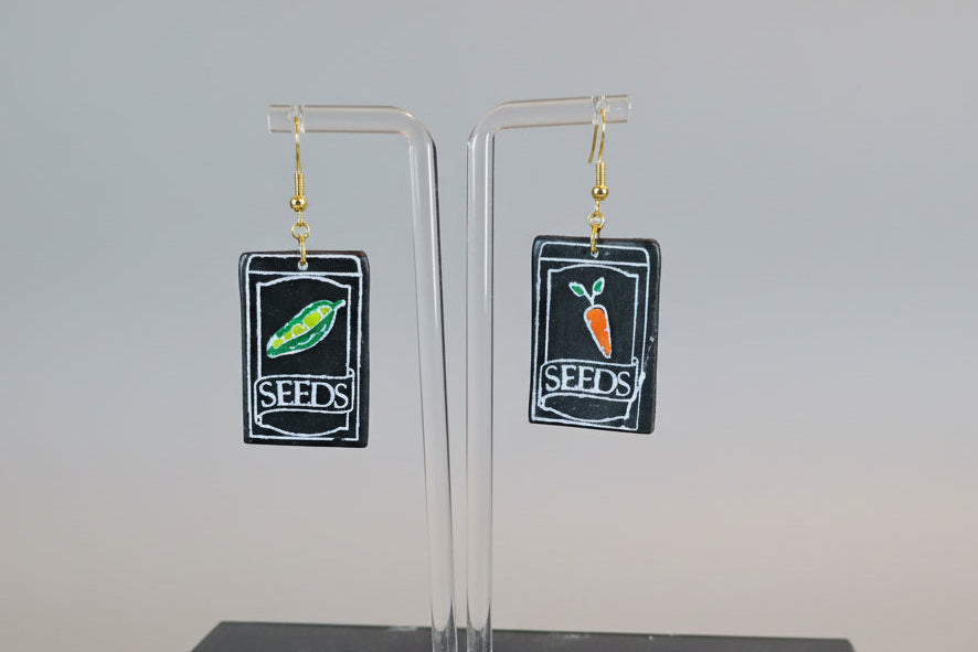 Seed packets peas and carrots