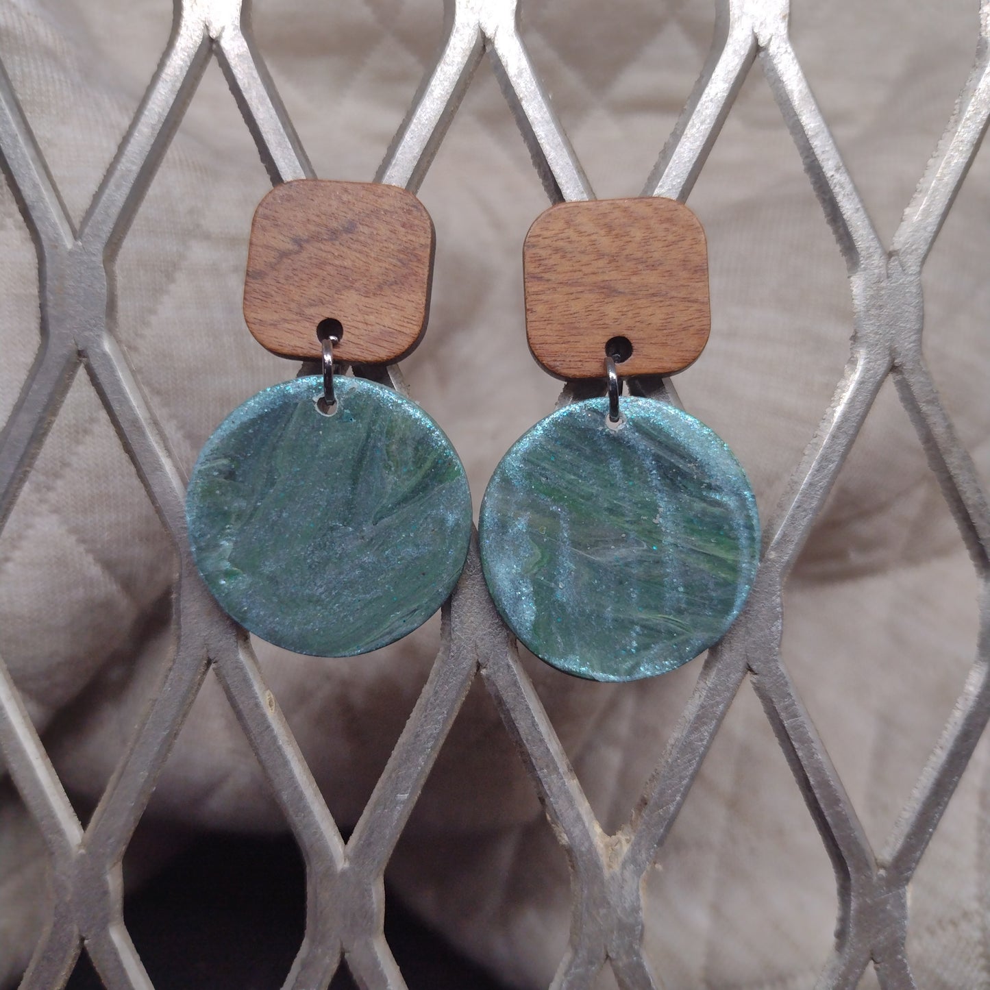 Green circle with square wood stud