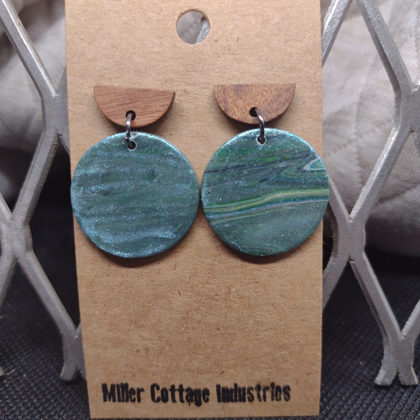 Green circles with half circle wood studs