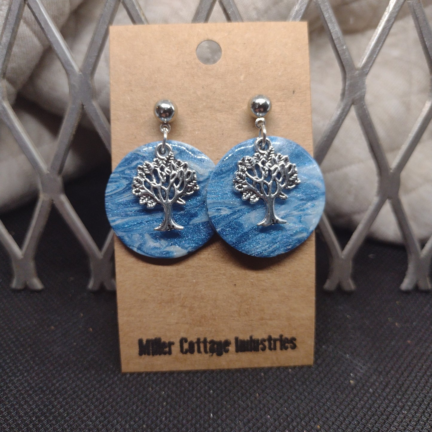 Blue and sparkly swirls with tree of life