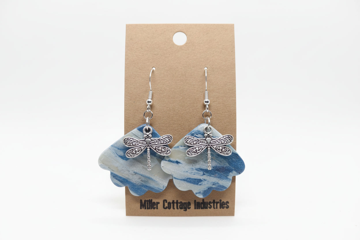 Blue and sparkling swirls with dragonfly