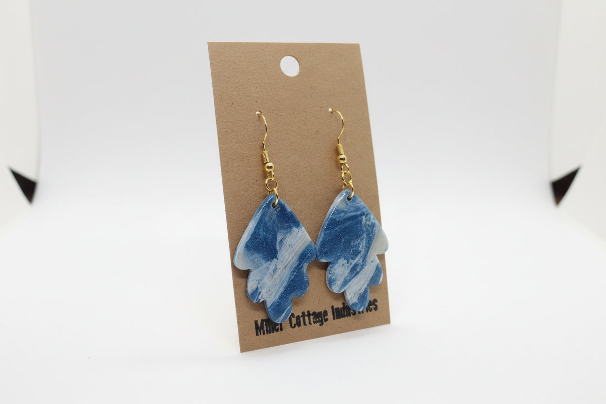 Blue and sparkling swirls in gold