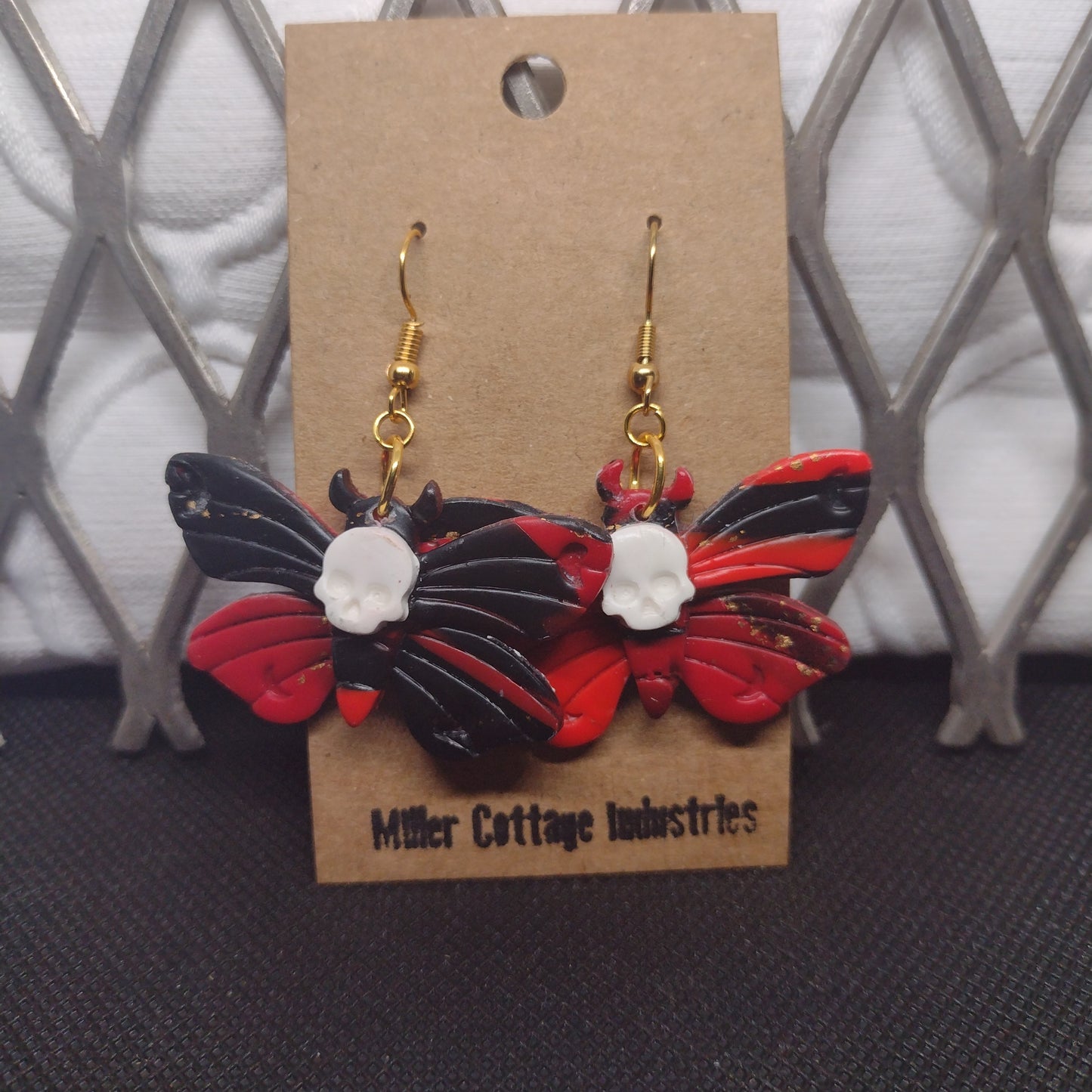 Red and black death moth