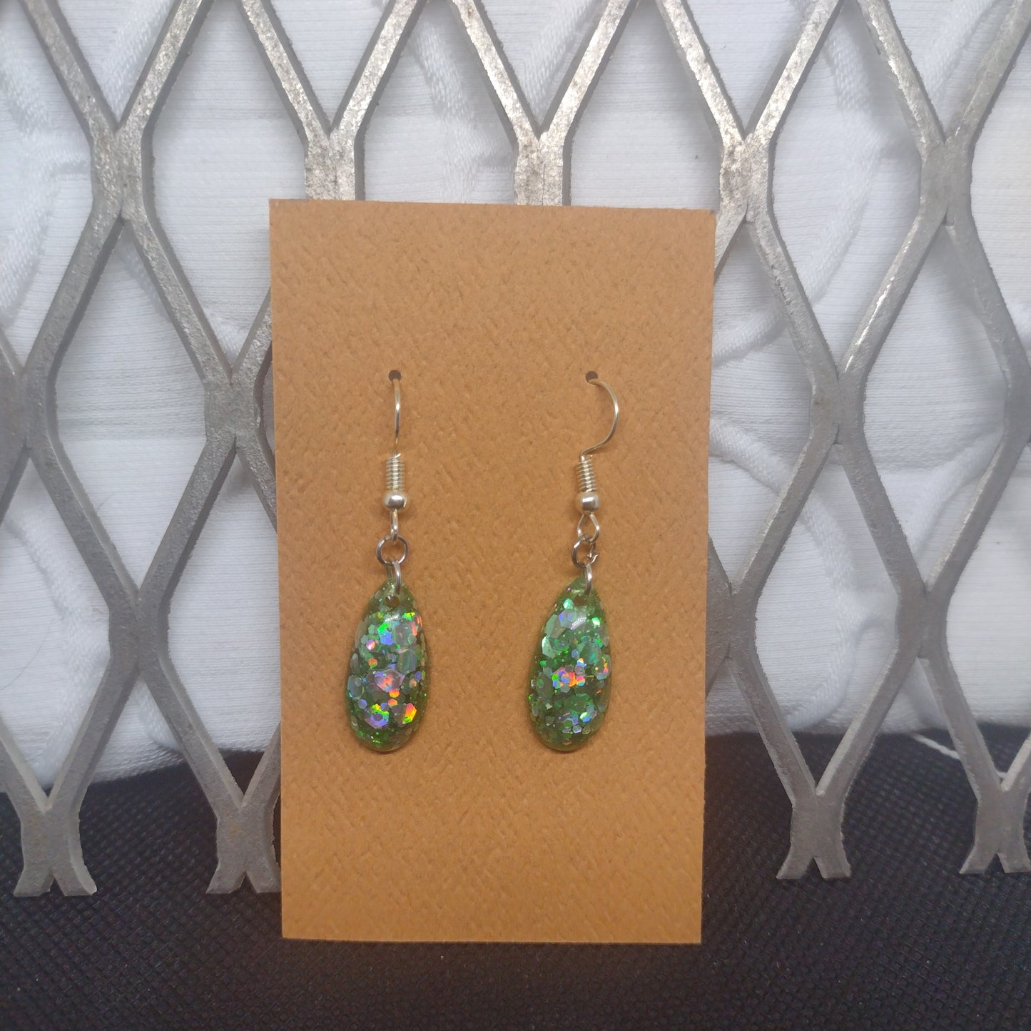 Green glitter tear drop