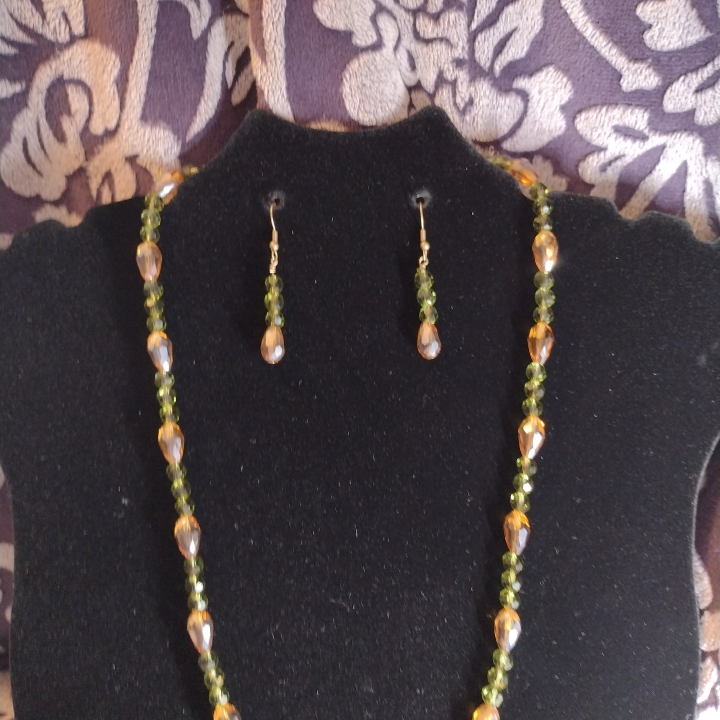 Green and brown topography necklace set