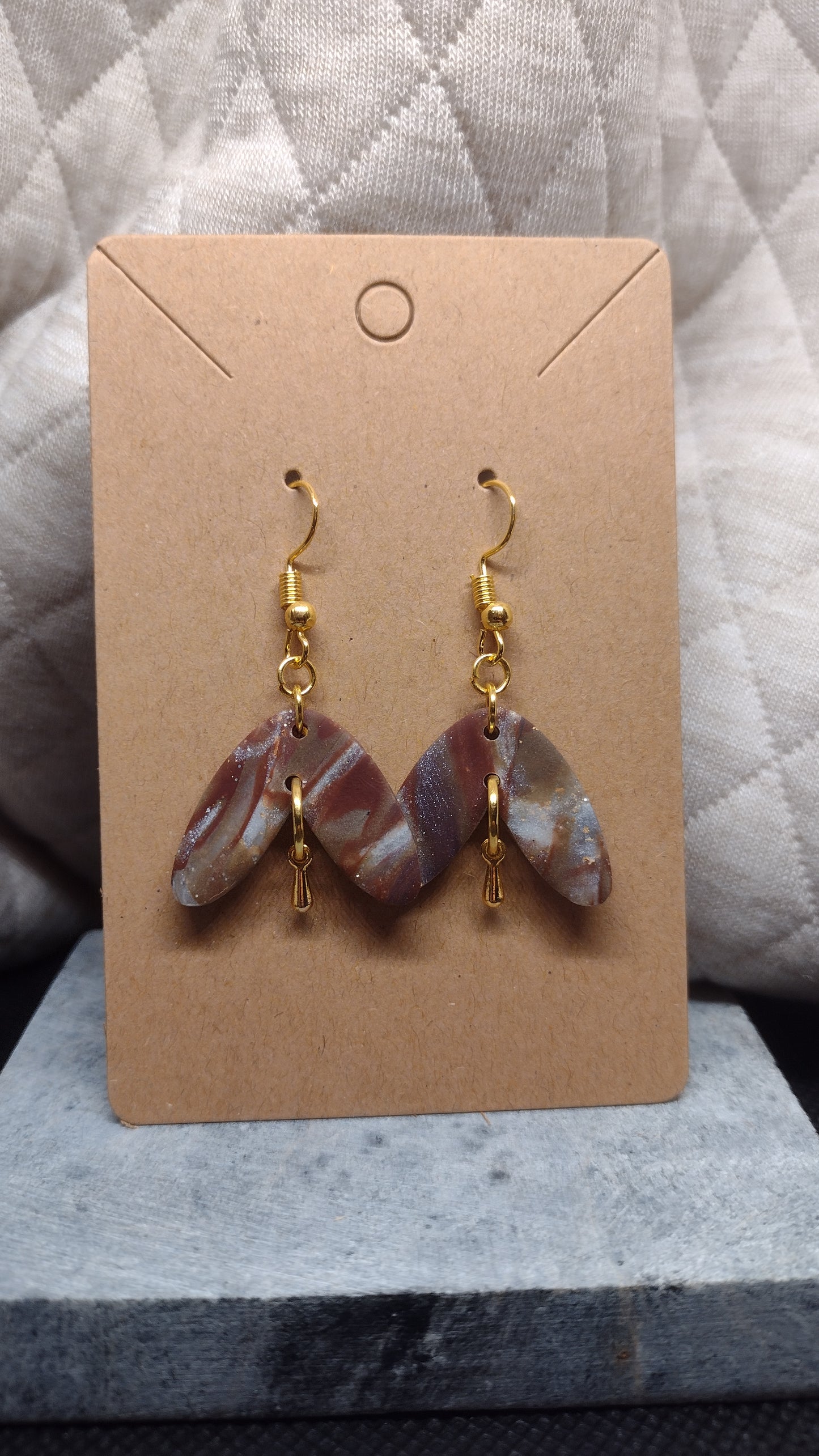 Woodland fish tail with gold