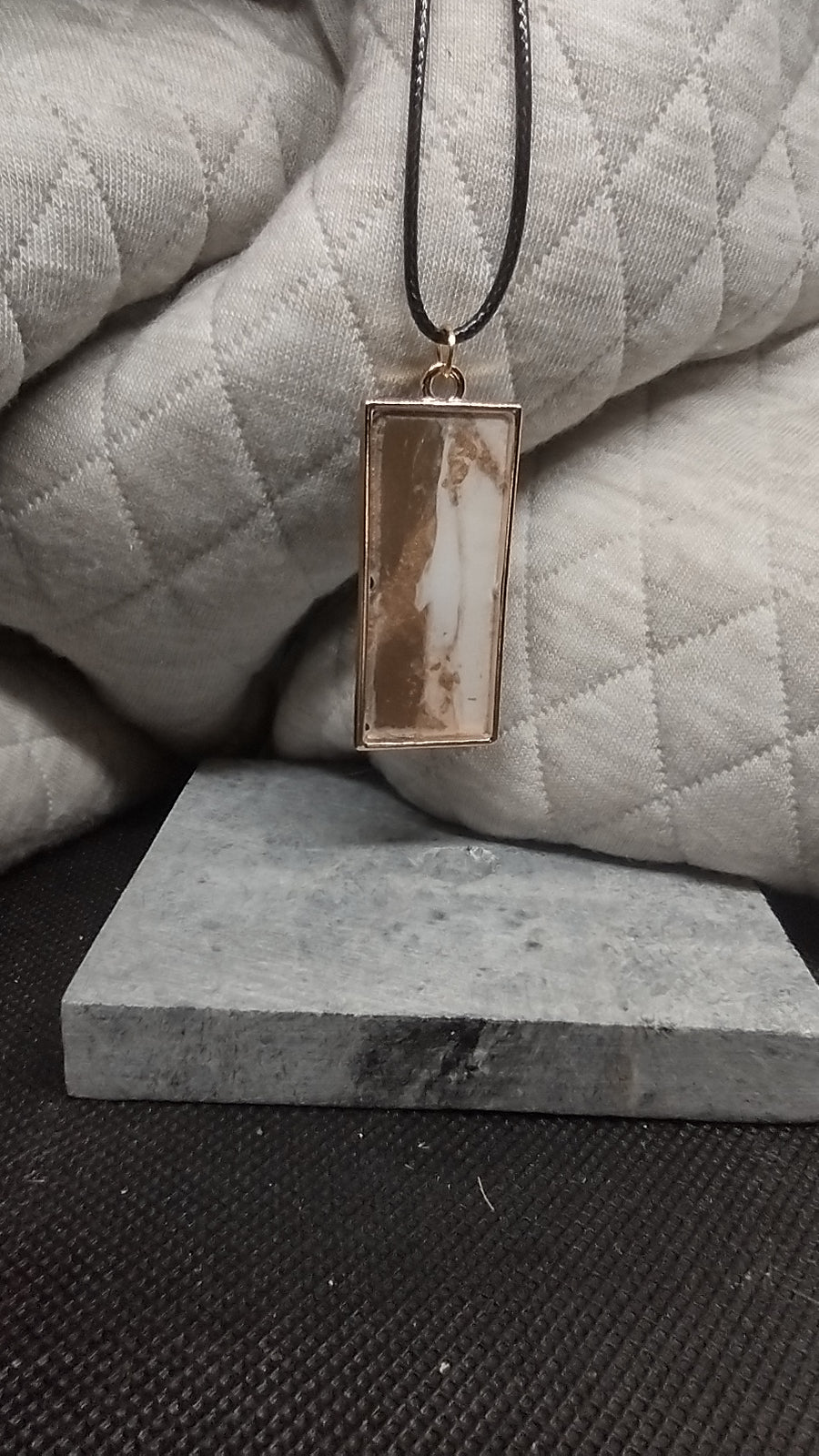 Brown, gold, and white rectangle pendant