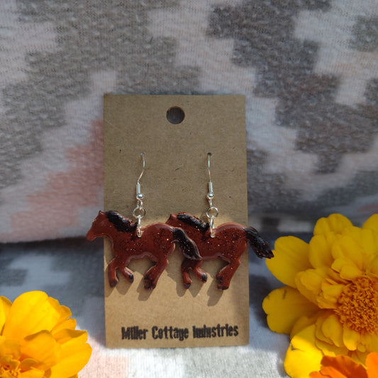 Horses in brown and black