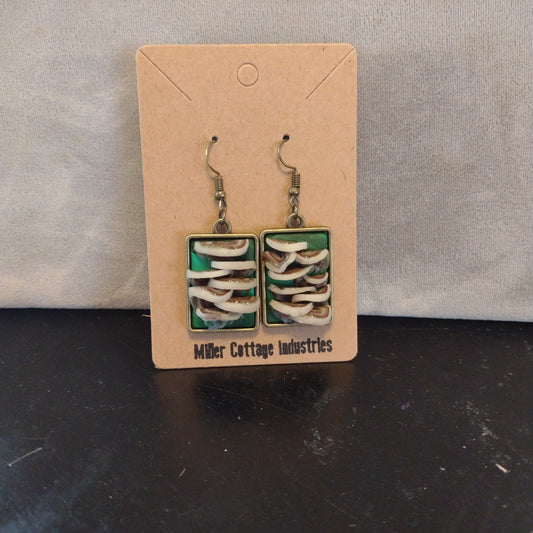 Mushroom shelves in antique bronze