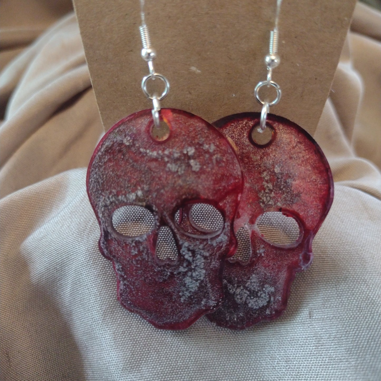 Holographic skulls red and silver