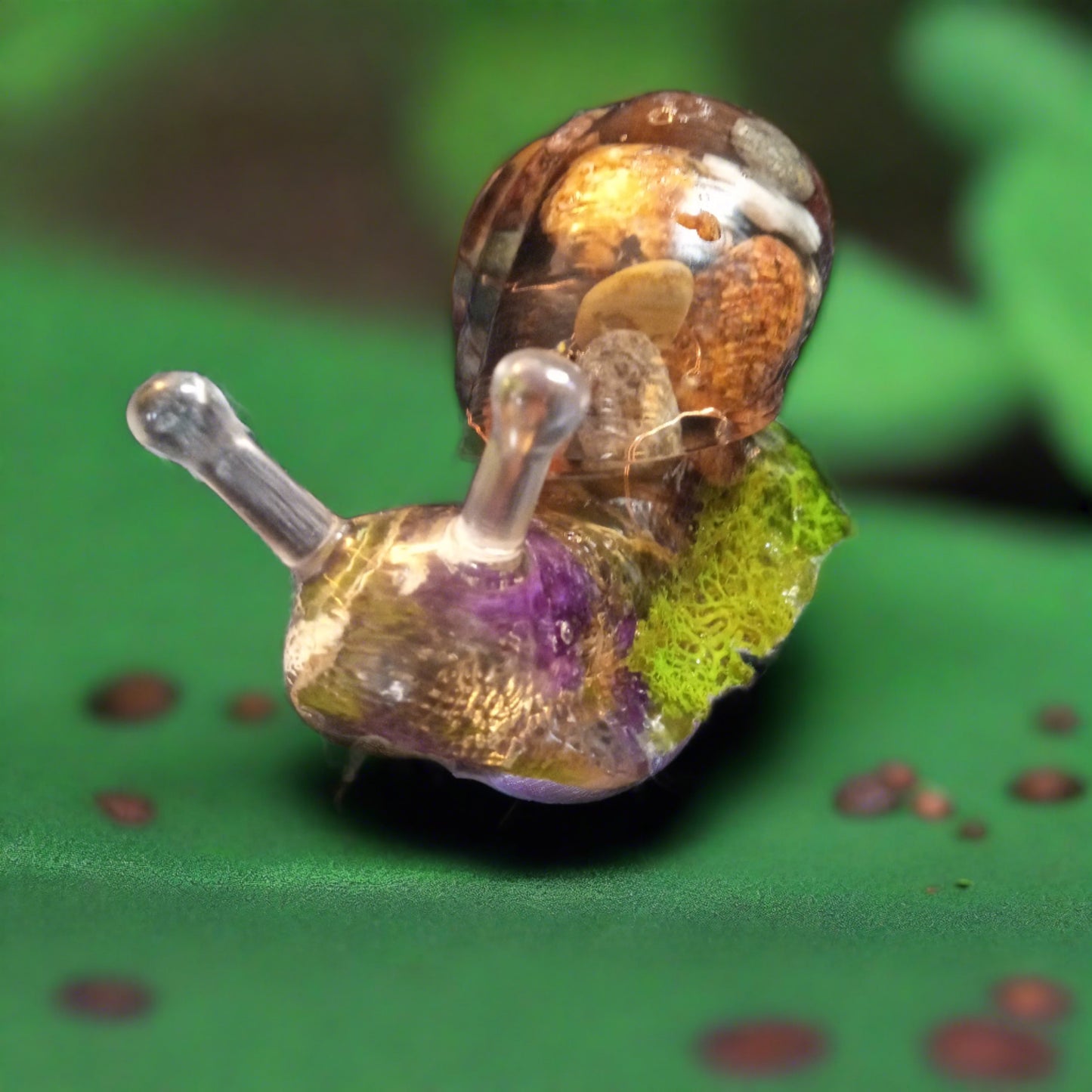 Snail with rocks and flowers light up