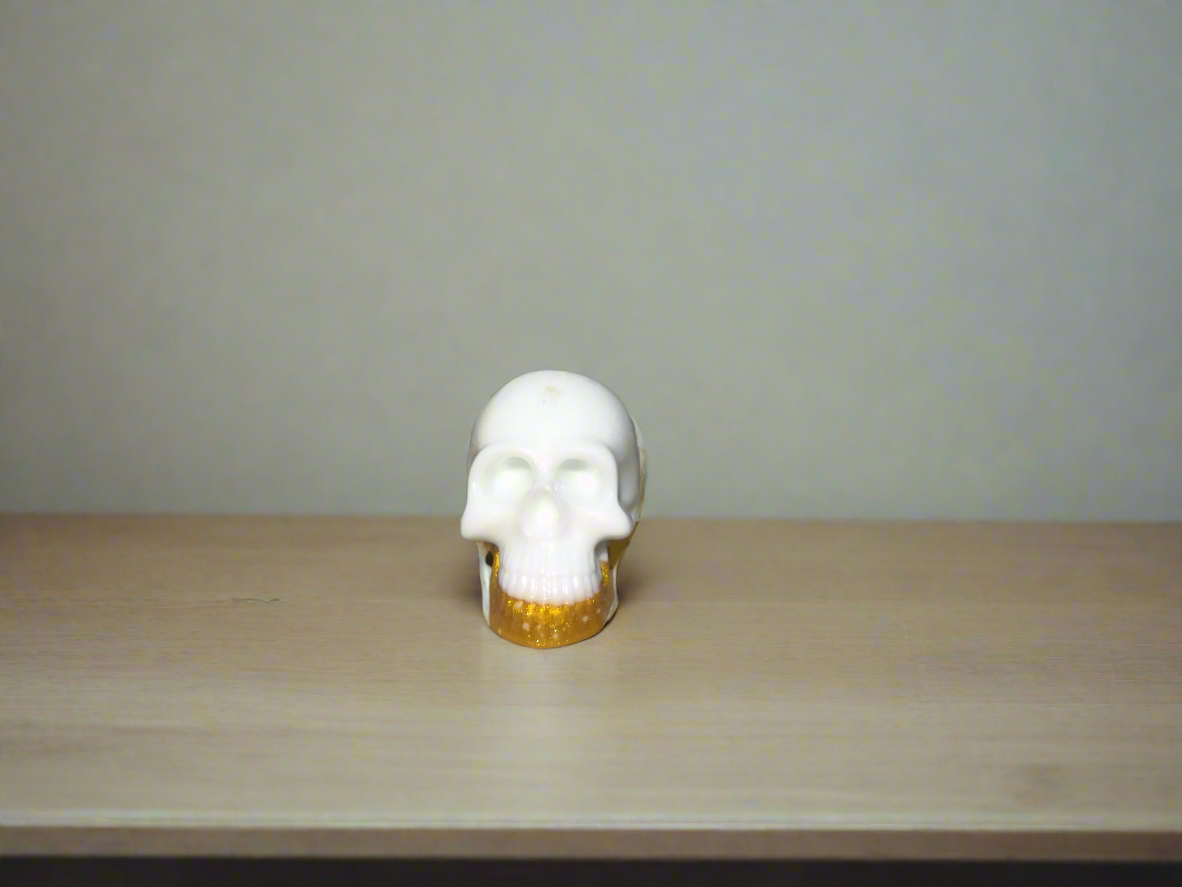 white and gold skull
