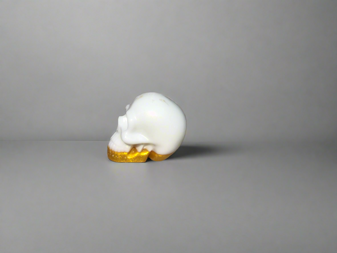 white and gold skull