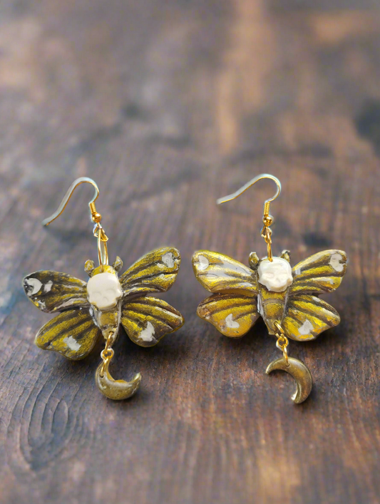 Black and gold death moth