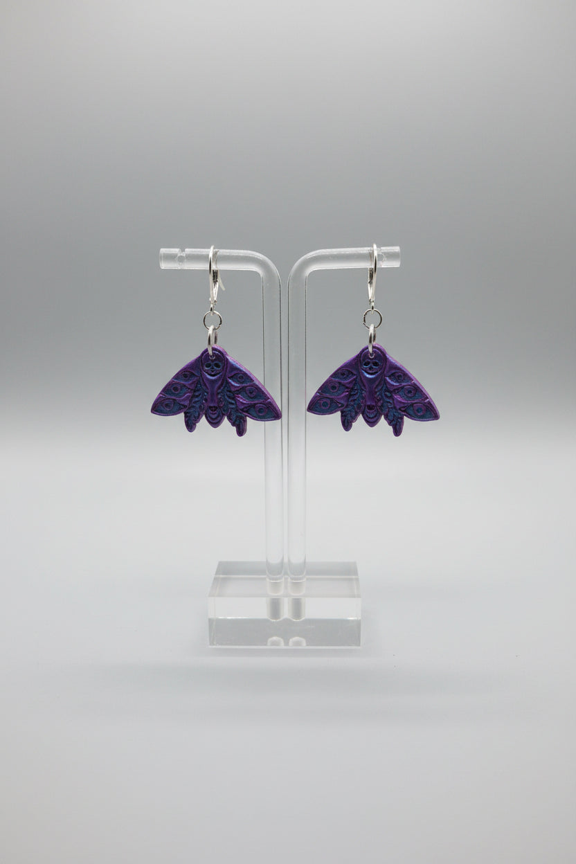 Purple and blue chrome dead moth