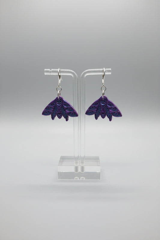 Purple and blue chrome dead moth