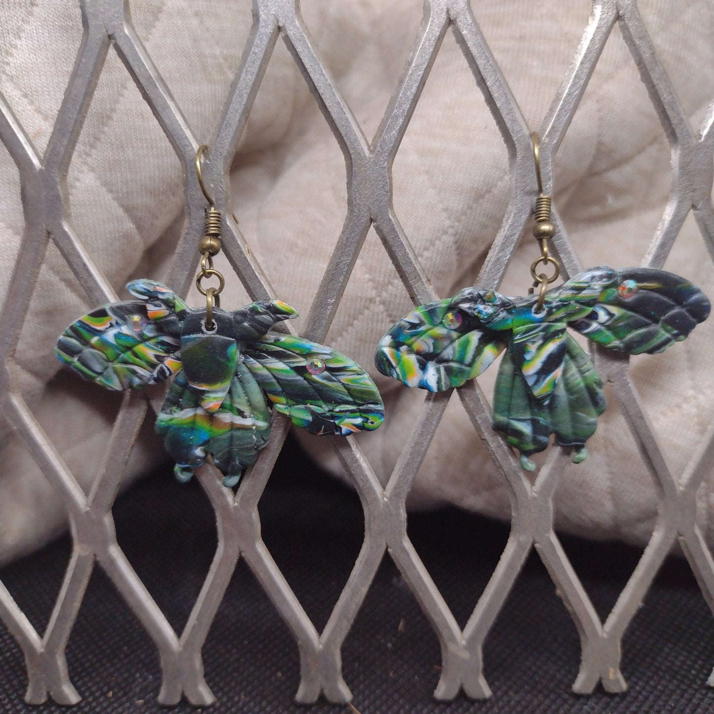 Camouflage moth with rhinestones