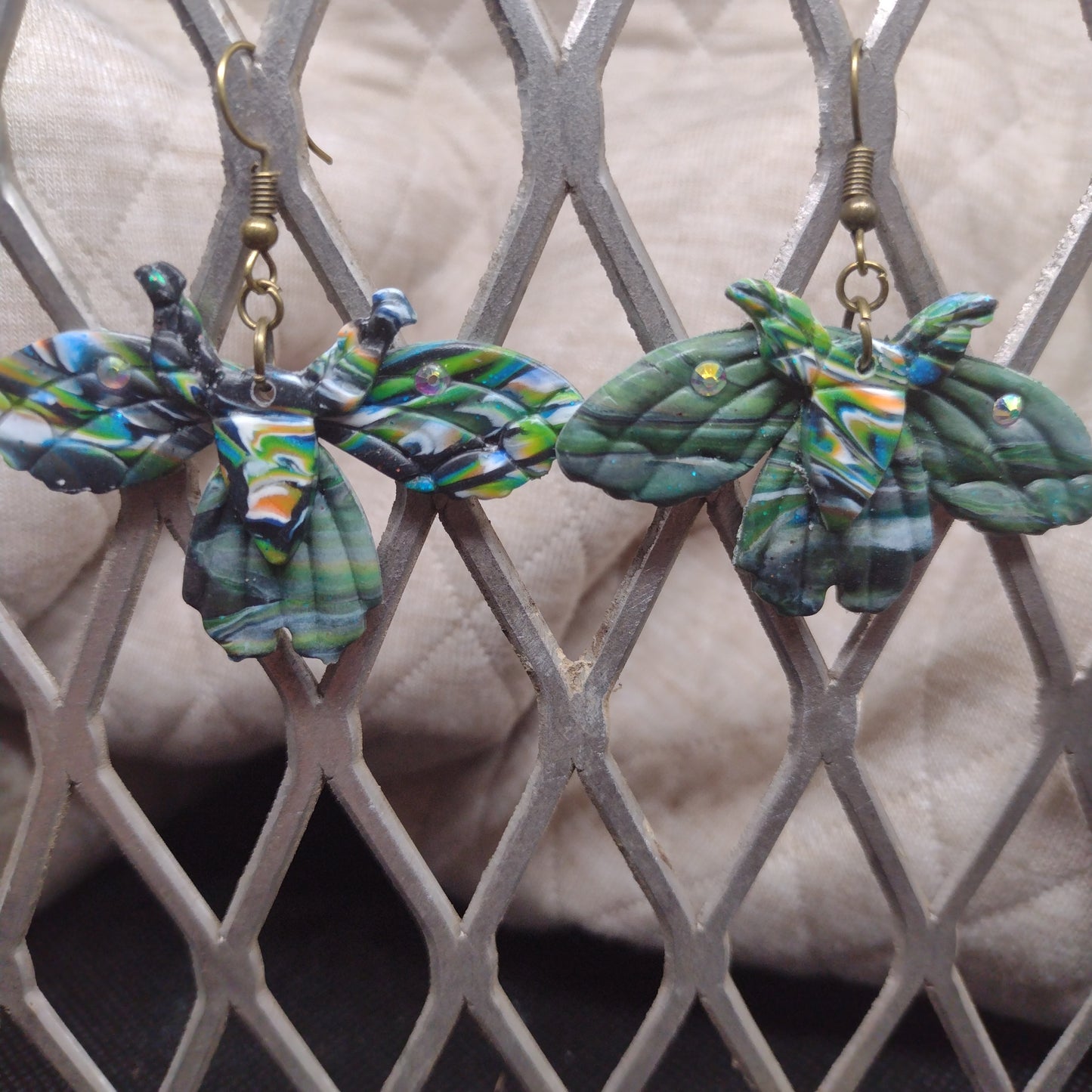 Camouflage moths with rhinestones