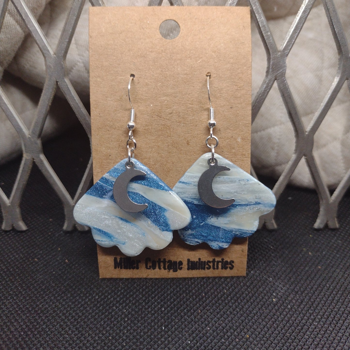 Blue with sparkly swirls and silver moon