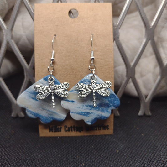 Blue and sparkling swirls with dragonfly