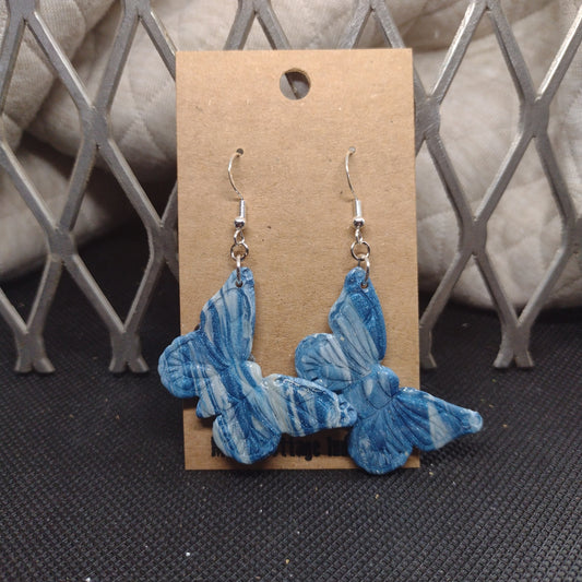 Blue and sparkling swirls butterfly