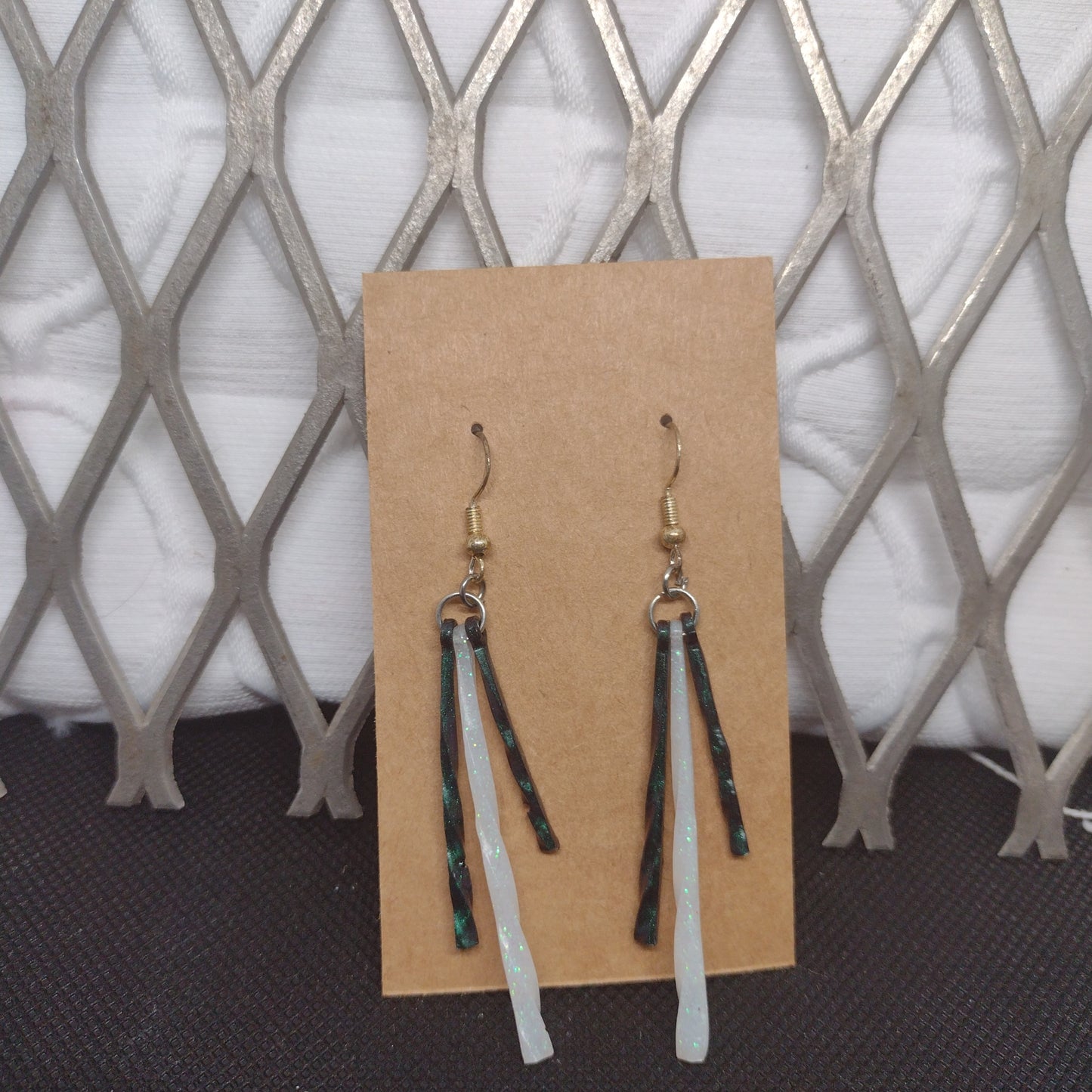 Green and white dangle
