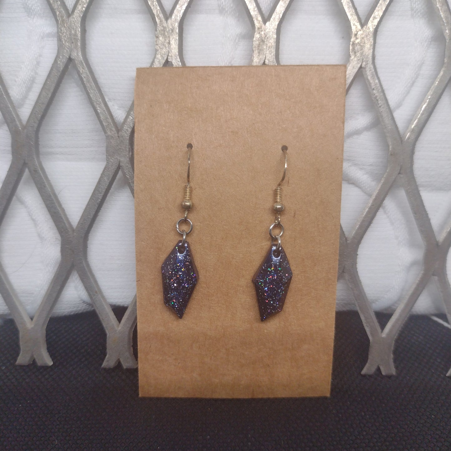 Dark blue glitter rock shape