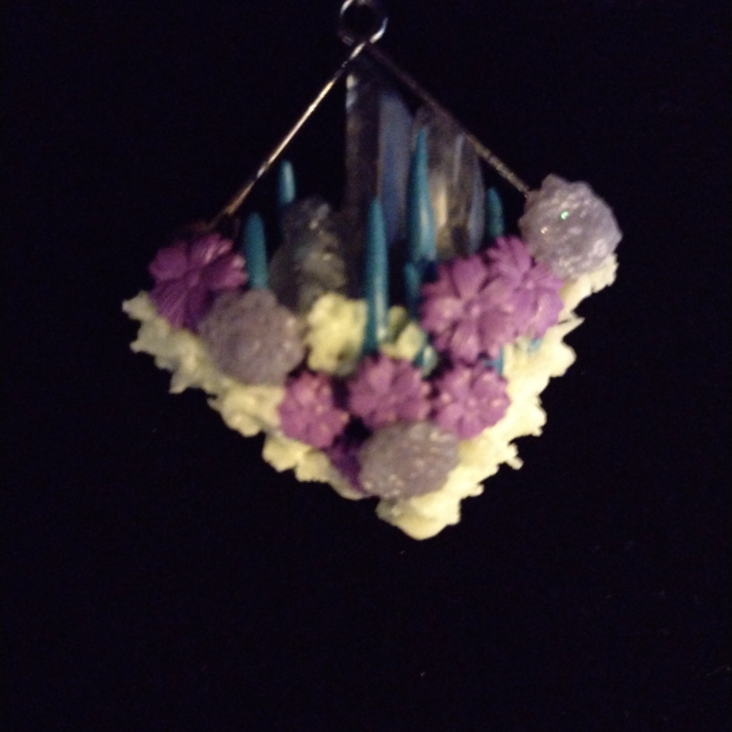 Crystals and glow-in-the-dark pendant on purple seed bead necklace. Matching stud earrings