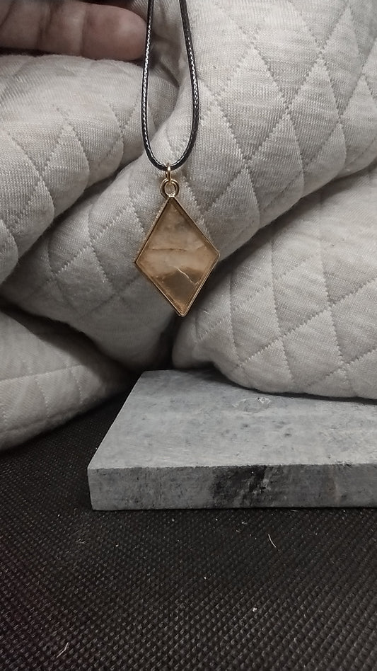 Brown, white and gold diamond pendant