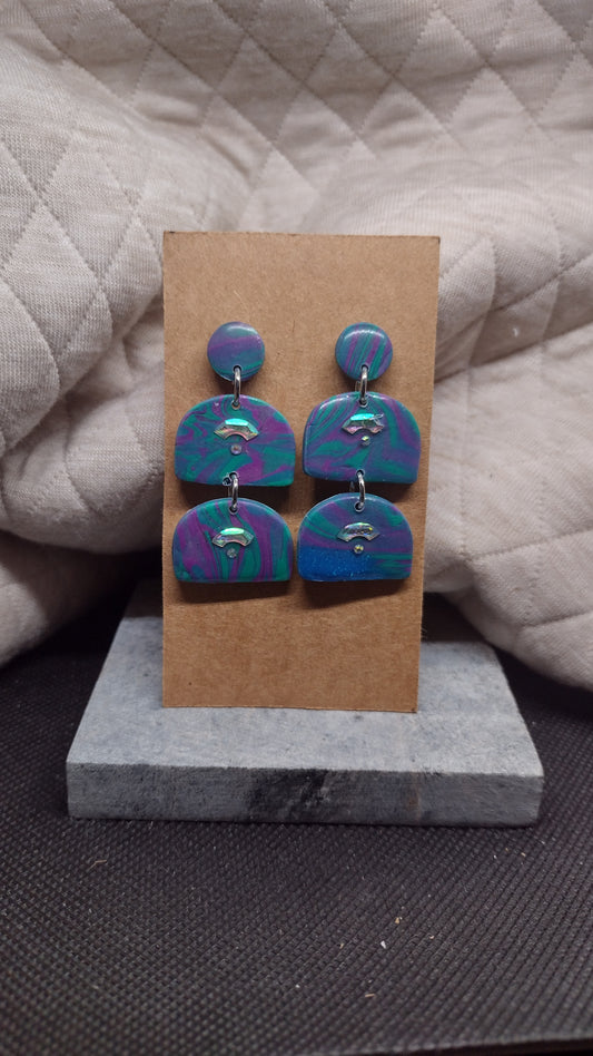 Large swirls with bling